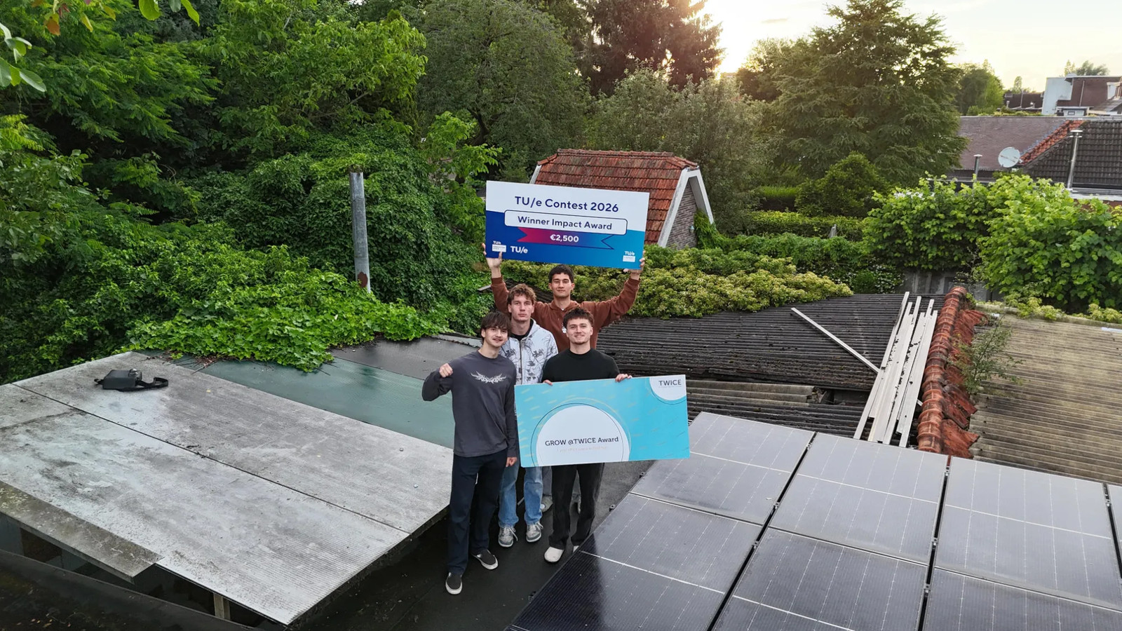 The Sunken Robotics team holding their TU/e Contest 2026 Impact Award and GROW @TWICE Award